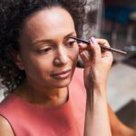 Close up of stylist that drawing eyebrow