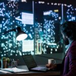 Private equity manager analyzing financial reports at night