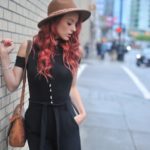 Styling tricks for wearing a short jumpsuit, creating a sophisticated outfit