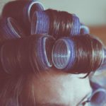 Use heated curlers to achieve defined, voluminous curls that last longer